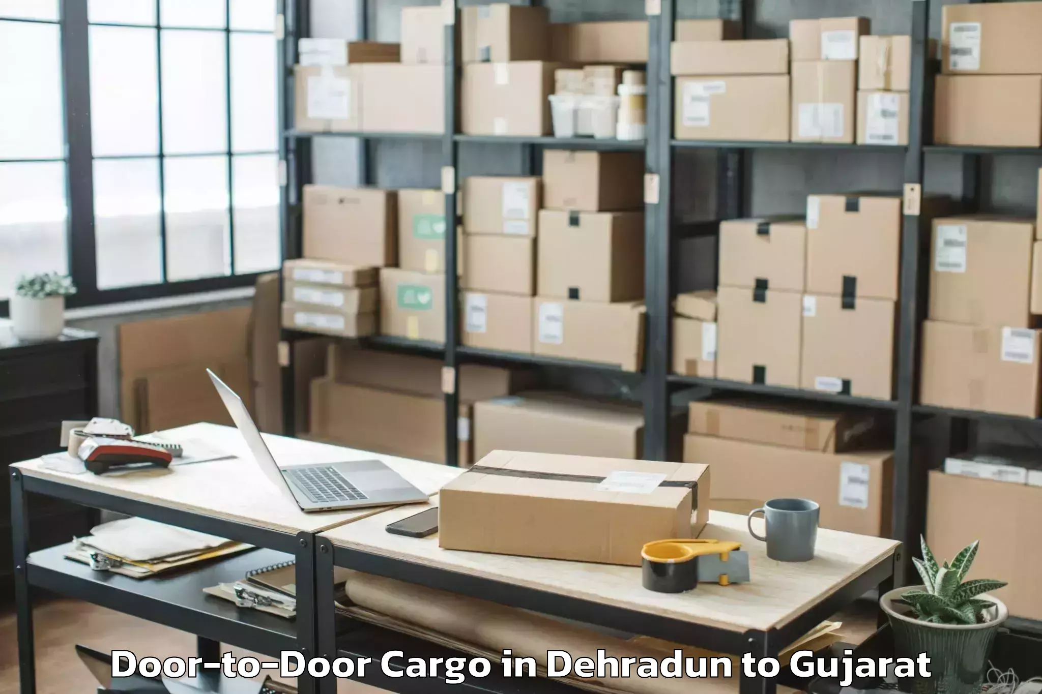 Leading Dehradun to Thasra Door To Door Cargo Provider